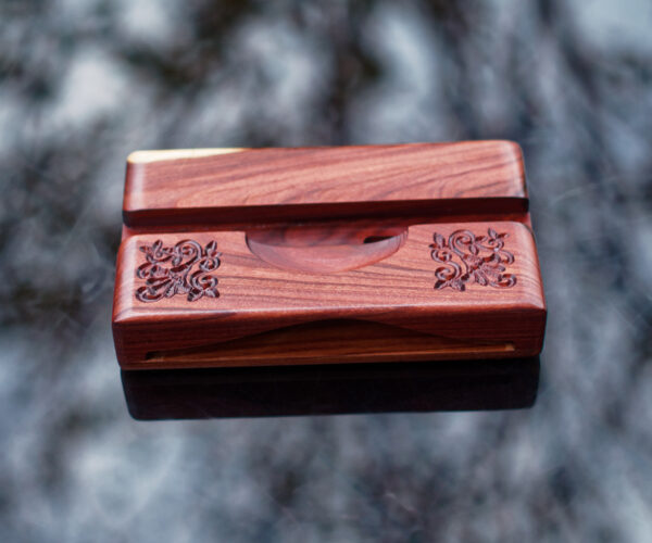 Rosewood speaker with carved flowers