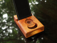 Macacauba wood speaker with a carved guitar